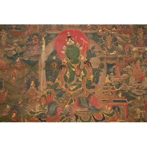 92 - A Tibetan Green Tara - sGrol-ma, possibly 18th century, surrounded by buddhas, divinities and Dalai ... 