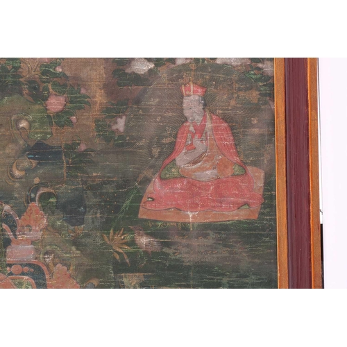 97 - A Tibetan thangka, 18th century, Thub-Chen the Fifth Black Hat Karmapa and rTogs-Idan the Second Red... 