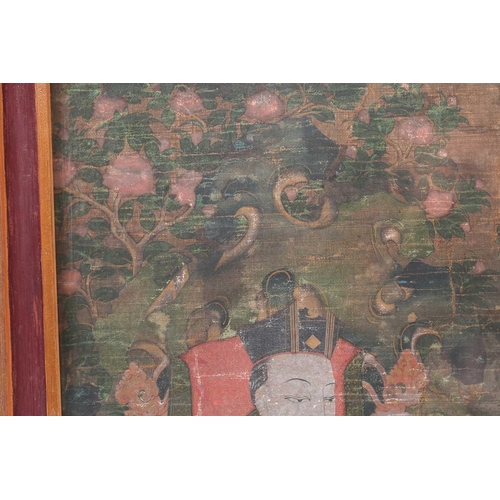 97 - A Tibetan thangka, 18th century, Thub-Chen the Fifth Black Hat Karmapa and rTogs-Idan the Second Red... 