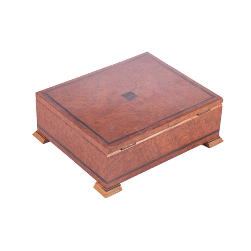 192 - David Linley a rectangular amboyna and zebrano strung cigar box, the hinged cover bearing an inset e... 