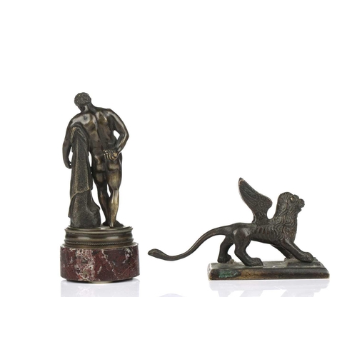 195 - A late grand tour patinated bronze encrier, 19th century, of two-handled form with single central co... 