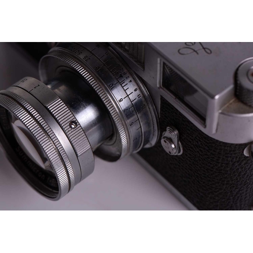 196 - A 1960 Leica M2 Rangefinder camera, chrome, serial no. 989419, with Leitz Elmar Summicron lens, f=5c... 