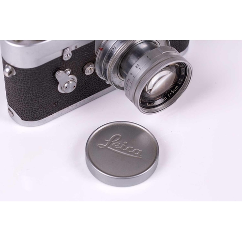 196 - A 1960 Leica M2 Rangefinder camera, chrome, serial no. 989419, with Leitz Elmar Summicron lens, f=5c... 