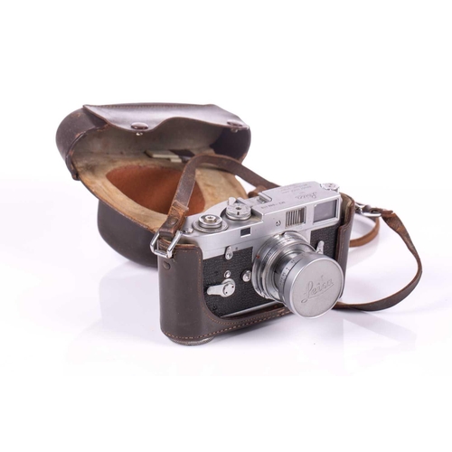 196 - A 1960 Leica M2 Rangefinder camera, chrome, serial no. 989419, with Leitz Elmar Summicron lens, f=5c... 