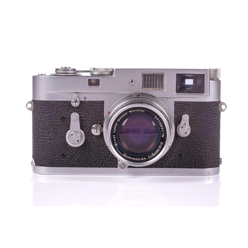 196 - A 1960 Leica M2 Rangefinder camera, chrome, serial no. 989419, with Leitz Elmar Summicron lens, f=5c... 