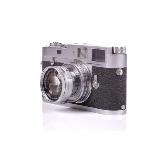 196 - A 1960 Leica M2 Rangefinder camera, chrome, serial no. 989419, with Leitz Elmar Summicron lens, f=5c... 