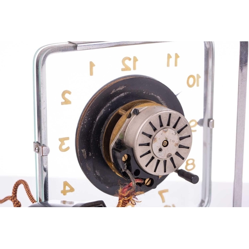 201 - A vintage Smiths 'mystery' style Art Deco rotating glass and chromium plated electric mantle clock, ... 