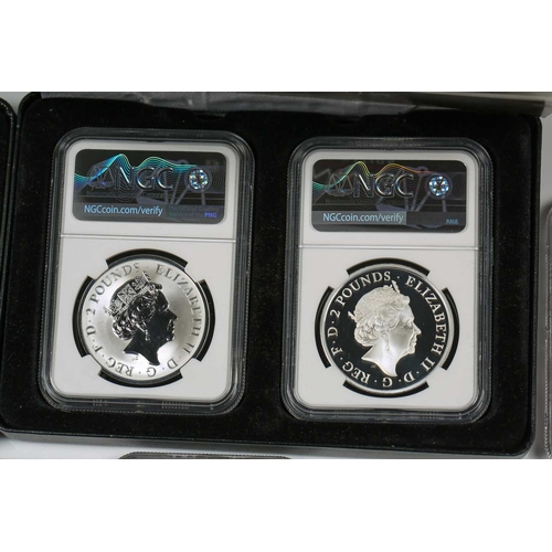 207 - A collection of eleven fine silver proof crown size coins, comprising two coin set Britannia 'The Sp... 