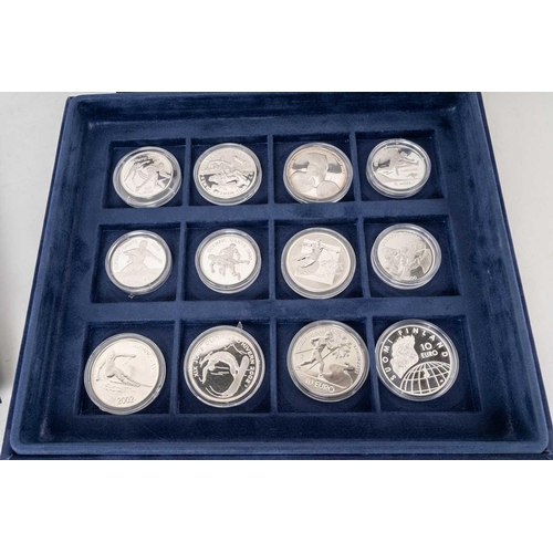 209 - A collection of 72 official silver proof commemorative coins of the Olympic Games, with certificates... 