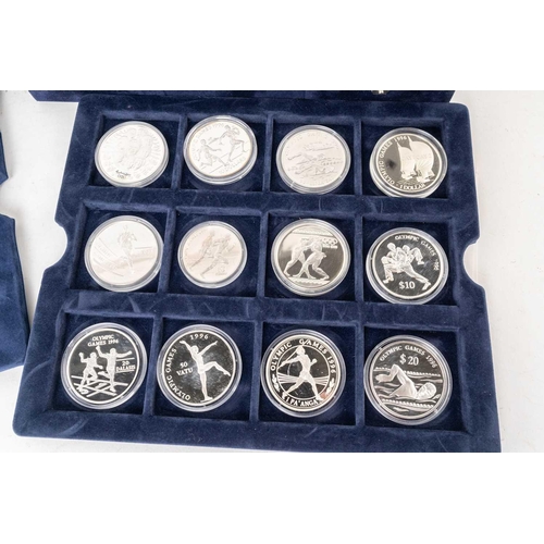 209 - A collection of 72 official silver proof commemorative coins of the Olympic Games, with certificates... 