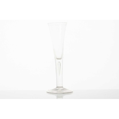 215 - An 18th century ale glass, the ogee bowl on a multiple opaque air twist stem and conical circular fo... 