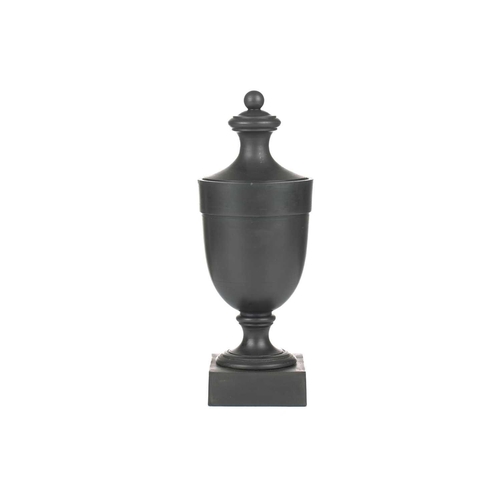 227 - Wedgwood & Bentley, Etruria: a late 18th century black basalt urn and cover, of plain form on a squa... 