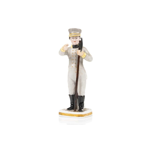 231 - A Russian Gardner porcelain figure of a City Guard, 1820s, from the Magic Lantern series, 16 cm high... 