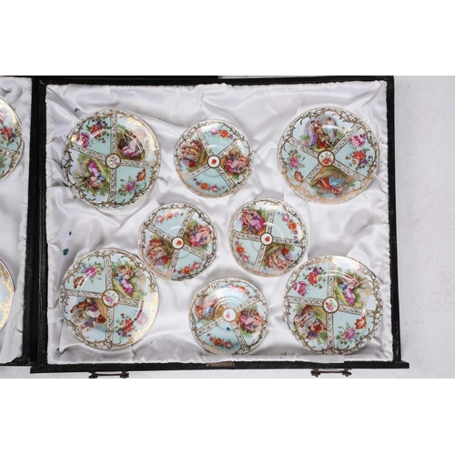 235 - A cased Austrian porcelain tea service for twelve persons, early 20th century decorated with scenes ... 