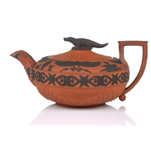 237 - A large Wedgwood rosso antico teapot and cover, early 19th century, with applied Egyptian decoration... 