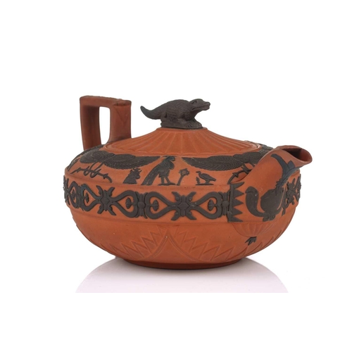 237 - A large Wedgwood rosso antico teapot and cover, early 19th century, with applied Egyptian decoration... 