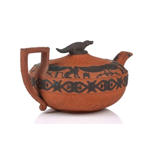 237 - A large Wedgwood rosso antico teapot and cover, early 19th century, with applied Egyptian decoration... 