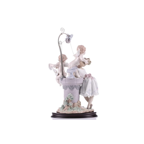 240 - A Lladro porcelain ltd edition 516/2000 figure group 