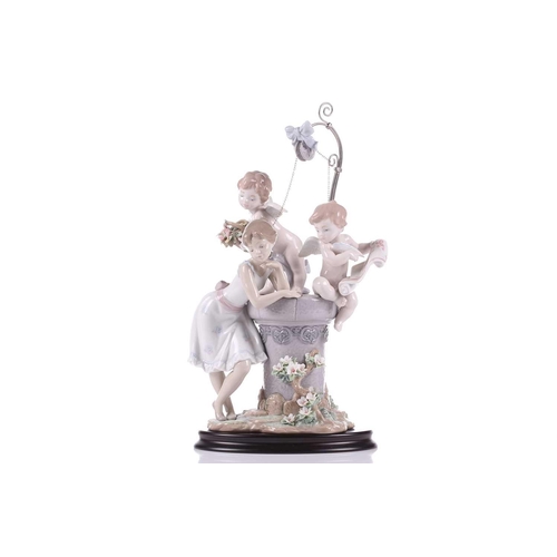 240 - A Lladro porcelain ltd edition 516/2000 figure group 