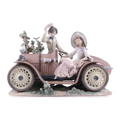 242 - A large and impressive Ltd edition 929/1500 Lladro porcelain figure group of a young couple and a vi... 