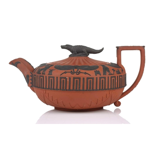 248 - A large Wedgwood rosso antico teapot and cover, early 19th century, with applied Egyptian decoration... 