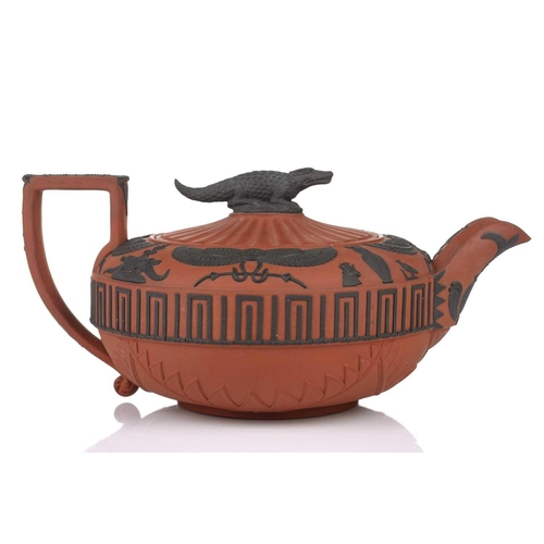 248 - A large Wedgwood rosso antico teapot and cover, early 19th century, with applied Egyptian decoration... 