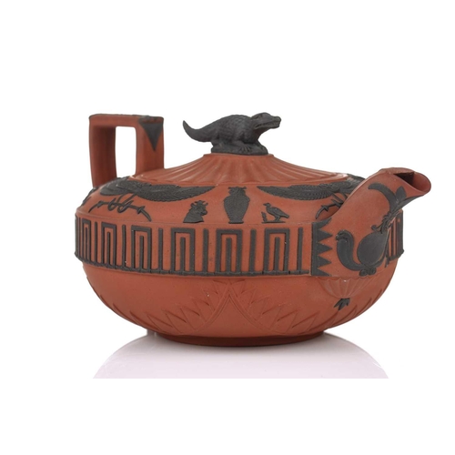 248 - A large Wedgwood rosso antico teapot and cover, early 19th century, with applied Egyptian decoration... 