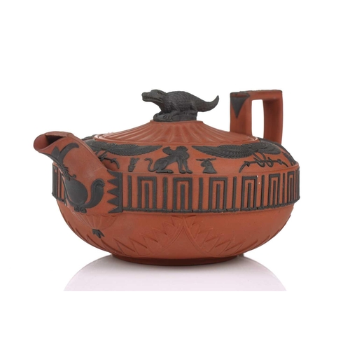 248 - A large Wedgwood rosso antico teapot and cover, early 19th century, with applied Egyptian decoration... 