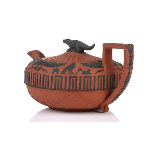 248 - A large Wedgwood rosso antico teapot and cover, early 19th century, with applied Egyptian decoration... 