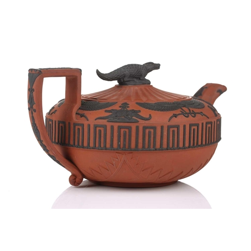 248 - A large Wedgwood rosso antico teapot and cover, early 19th century, with applied Egyptian decoration... 