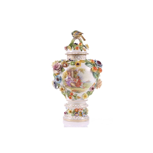 249 - A Dresden porcelain flower encrusted baluster vase and cover, early/mid 20th century, with high dome... 