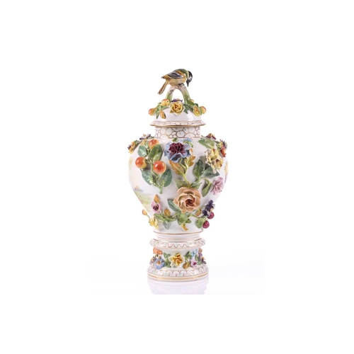 249 - A Dresden porcelain flower encrusted baluster vase and cover, early/mid 20th century, with high dome... 