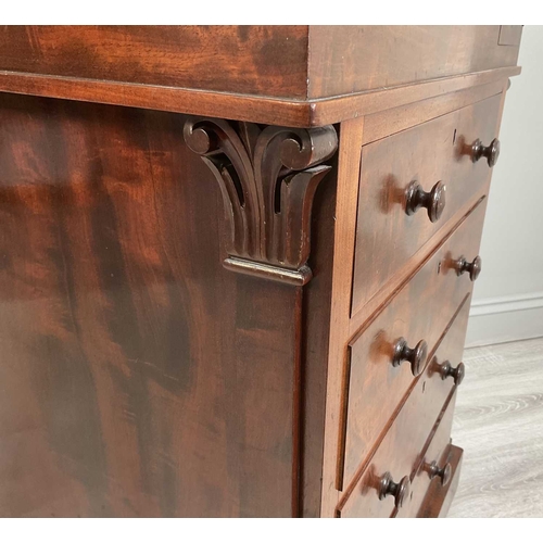 115A - An early Victorian mahogany Davenport desk with a sliding leather inset and fitted top section above... 