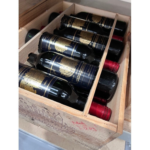 199 - A twelve-bottle case of Chateau Palmer, Margaux, 1986, ullage upper mid shoulder