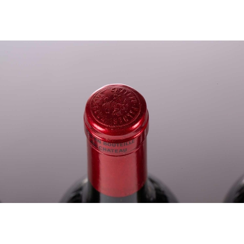 13 - A twelve-bottle case of Chateau Palmer, Margaux, 1986, ullage upper mid shoulder