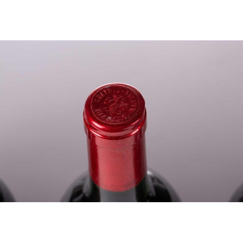 13 - A twelve-bottle case of Chateau Palmer, Margaux, 1986, ullage upper mid shoulder