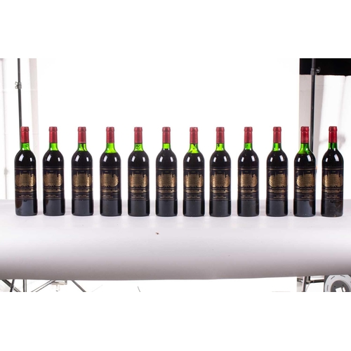13 - A twelve-bottle case of Chateau Palmer, Margaux, 1986, ullage upper mid shoulder