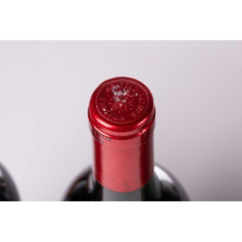 13 - A twelve-bottle case of Chateau Palmer, Margaux, 1986, ullage upper mid shoulder