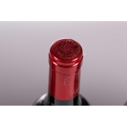 13 - A twelve-bottle case of Chateau Palmer, Margaux, 1986, ullage upper mid shoulder