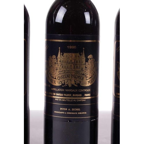 13 - A twelve-bottle case of Chateau Palmer, Margaux, 1986, ullage upper mid shoulder