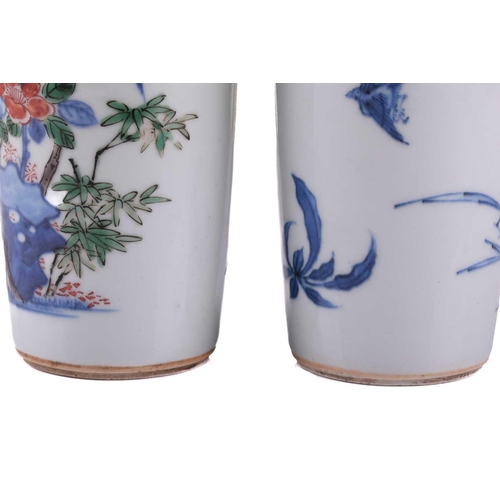 126 - A very close pair of Chinese porcelain vases, Qing, each almost identically decorated in underglaze ... 