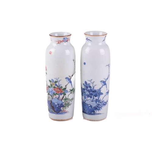 126 - A very close pair of Chinese porcelain vases, Qing, each almost identically decorated in underglaze ... 