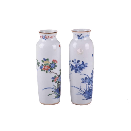 126 - A very close pair of Chinese porcelain vases, Qing, each almost identically decorated in underglaze ... 