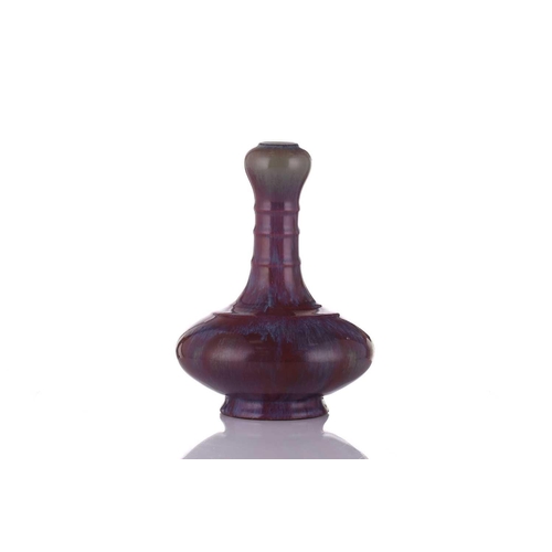 132 - A Chinese flambe glaze suantouping vase, possibly 18th century, the neck with three raised bands abo... 