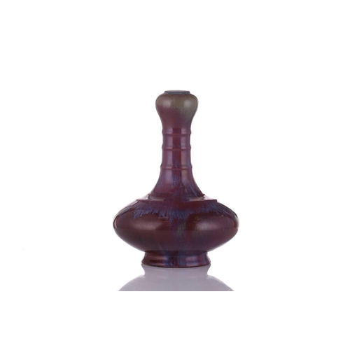 132 - A Chinese flambe glaze suantouping vase, possibly 18th century, the neck with three raised bands abo... 