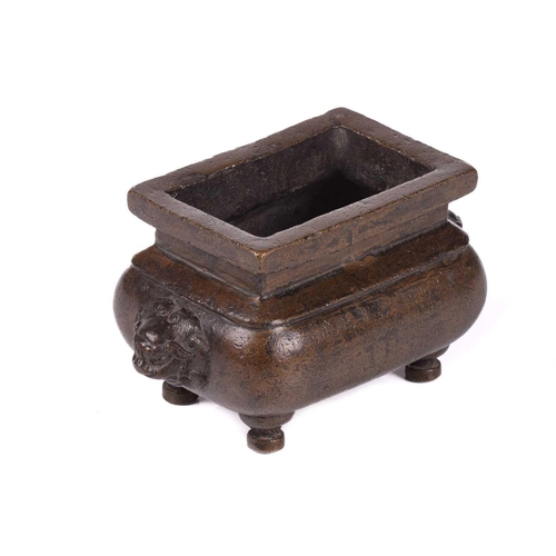 133 - A Chinese bronze censer for the Islamic market, of rectangular form with everted rim, the swollen bo... 