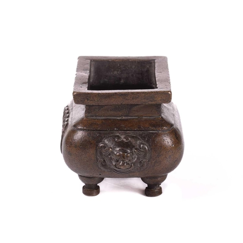 133 - A Chinese bronze censer for the Islamic market, of rectangular form with everted rim, the swollen bo... 