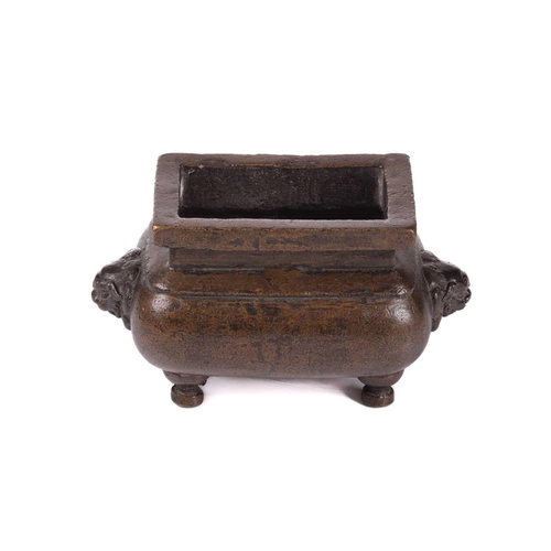 133 - A Chinese bronze censer for the Islamic market, of rectangular form with everted rim, the swollen bo... 