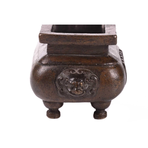 133 - A Chinese bronze censer for the Islamic market, of rectangular form with everted rim, the swollen bo... 