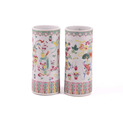 140 - A pair of Chinese porcelain sleeve vases, early 20th century, painted with a band of ruyi heads abov... 